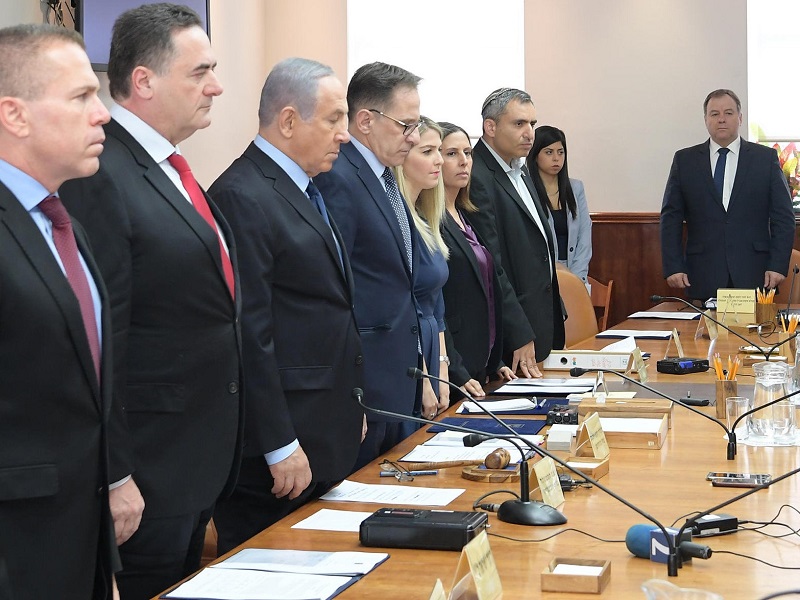 Ministers observing a minute of silence